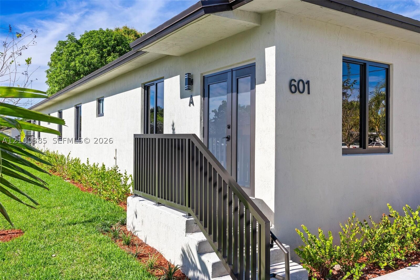 Property Photo:  601 NW 3rd Ave A  FL 33009 