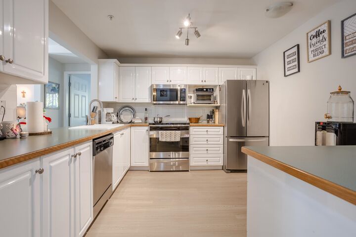 Property Photo:  6557 121 Street 205  BC V3W 1E7 