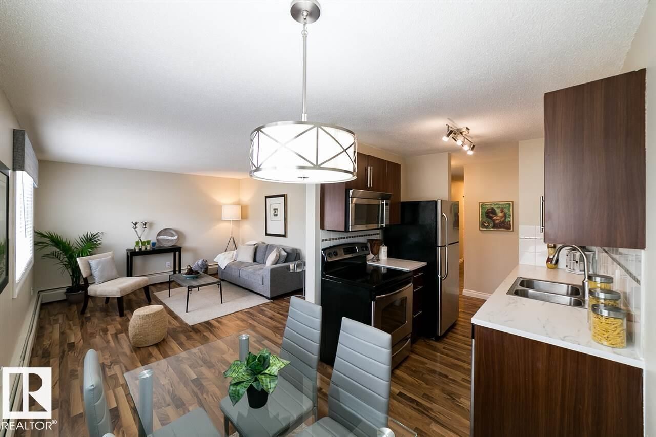 Property Photo:  12223 82 Street NW 203  AB T5B 2W9 