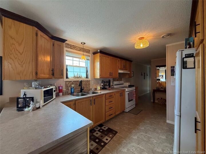 Property Photo:  31 Lombardie Street  NB E7B 2X8 