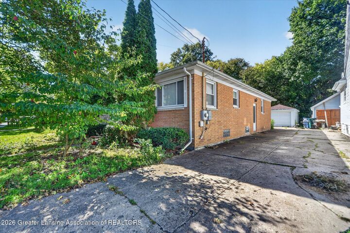 Property Photo: 423 N Foster Avenue MI 48912