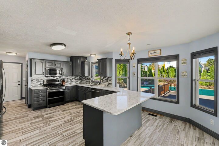 Property Photo:  6732 Conestoga Drive  MI 48917 