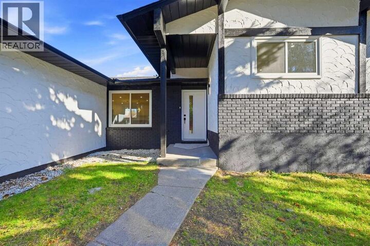 Property Photo:  460 Queensland Place Southeast  AB T2J 5C9 
