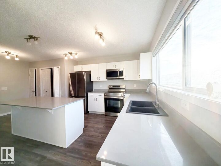Property Photo:  9606 Colak Link SW SW  AB T6W 5B6 