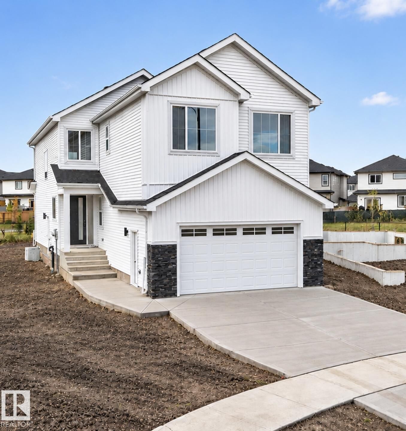 Property Photo:  318 Elliott Wynd  AB T8L 3X6 