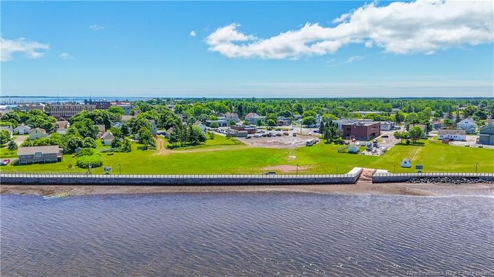 Property Photo:  204 Jd Gauthier Boulevard  NB E8S 1P3 