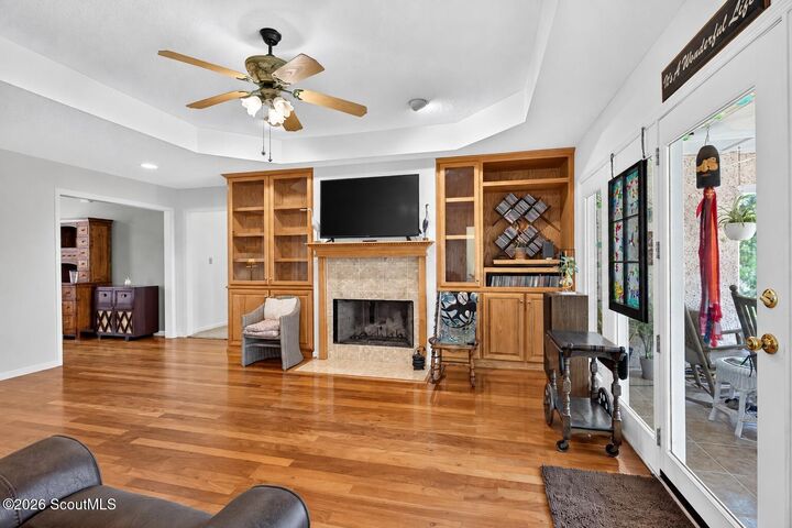 Family room with fireplace and built-ins