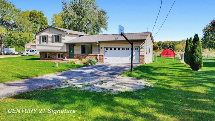 Property Photo:  10336 N Linden Road  MI 48420 