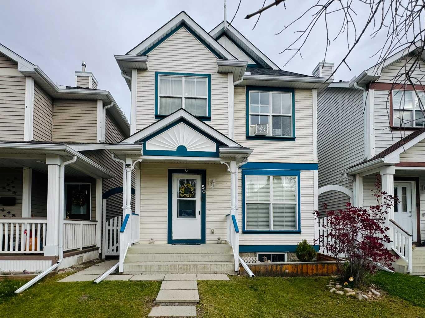 Property Photo:  50 Prestwick Way  AB T2Z 3L9 