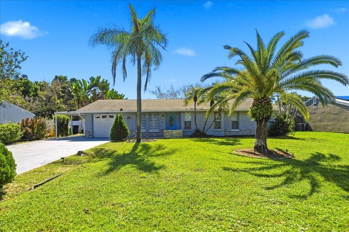 Property Photo: 2031 SE New York Street FL 34952