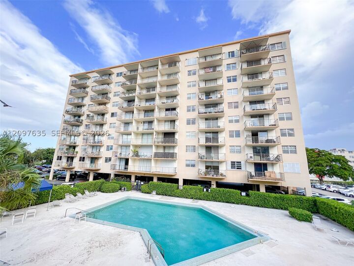 Property Photo:  1470 NE 125th Ter Ph3  FL 33161 