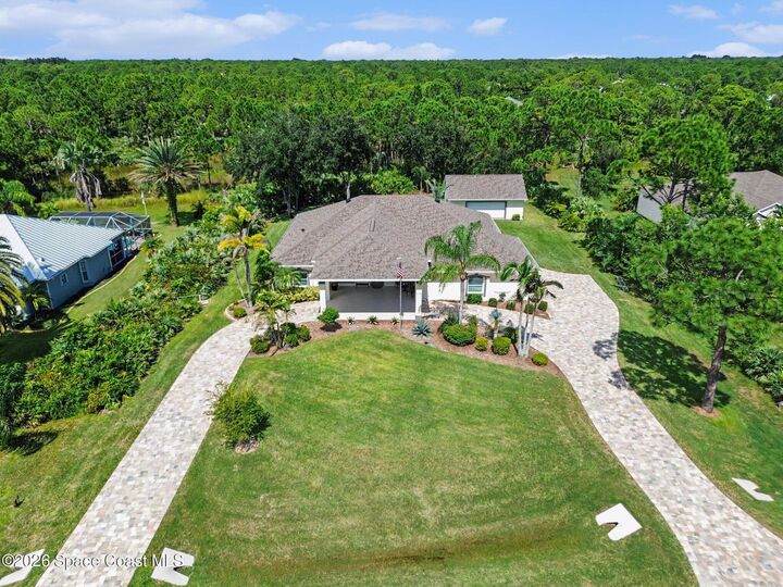 Property Photo:  7119 Hacienda Drive  FL 32949 