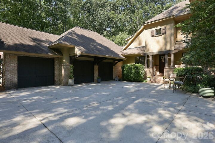 Property Photo:  115 Saddle Creek Court  NC 28036 
