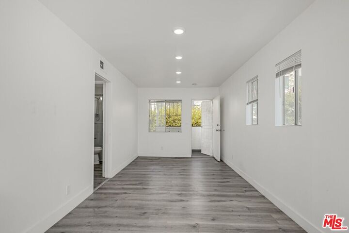 Property Photo:  124 S Almont Dr, Unit 1  CA 90211 