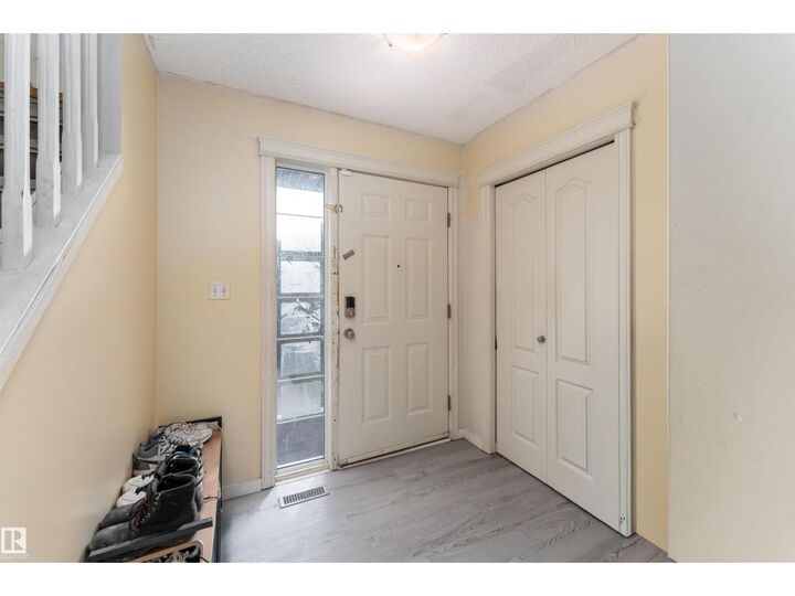 Property Photo:  8910 7 Av SW  AB T6X 1B9 