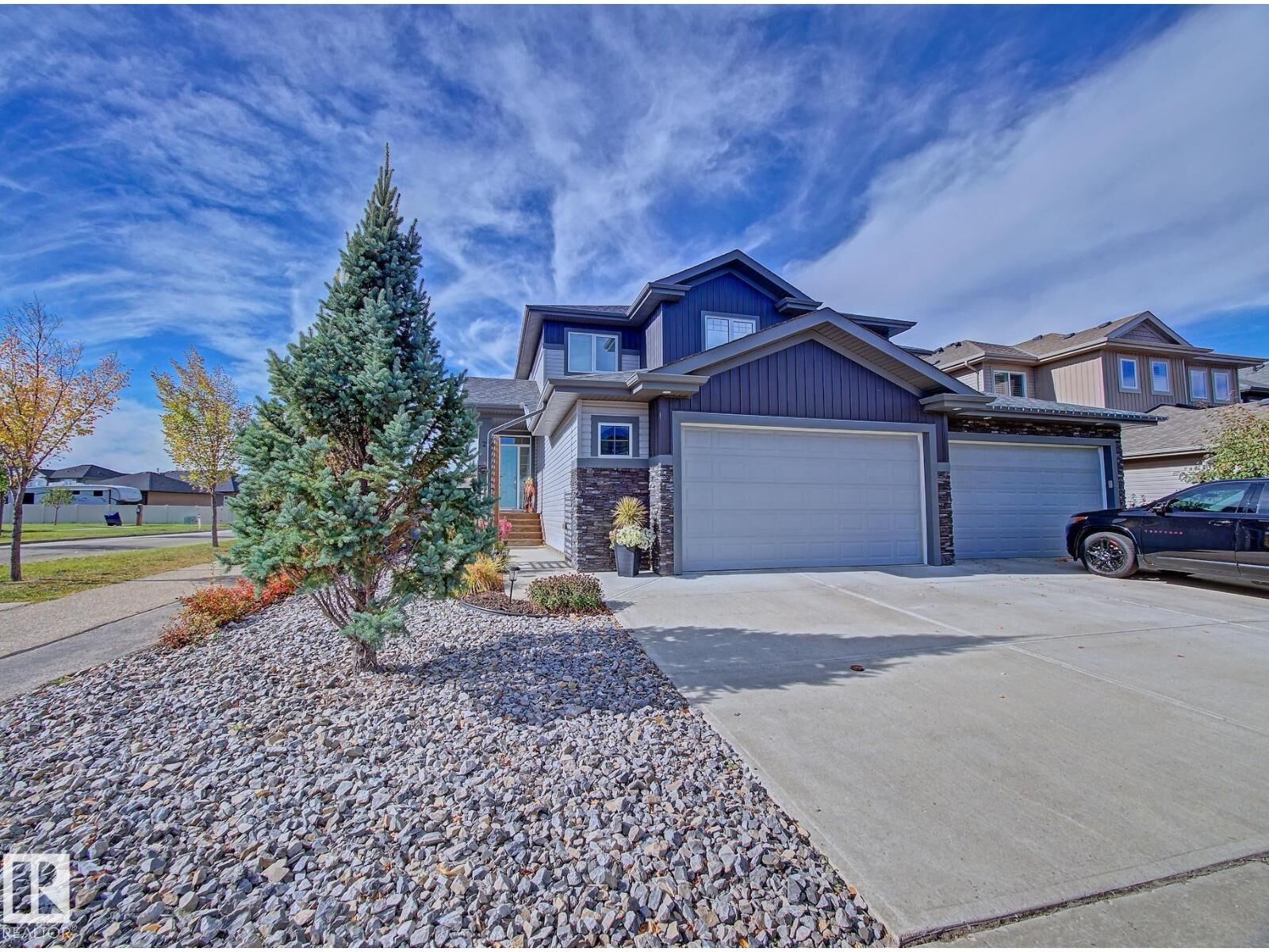 Property Photo:  2 Durrand Bn  AB T8L 0N2 