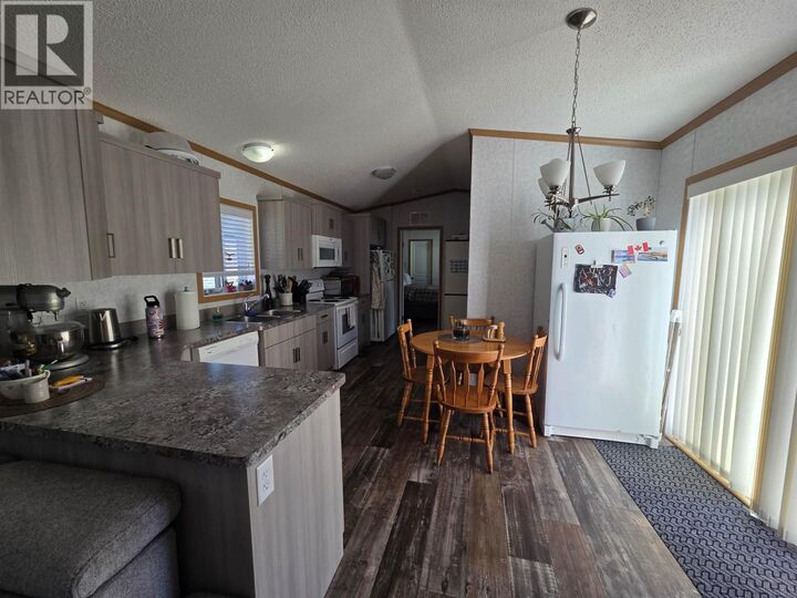 Property Photo:  5204 Ackroyd Street 121  BC V8G 1E6 