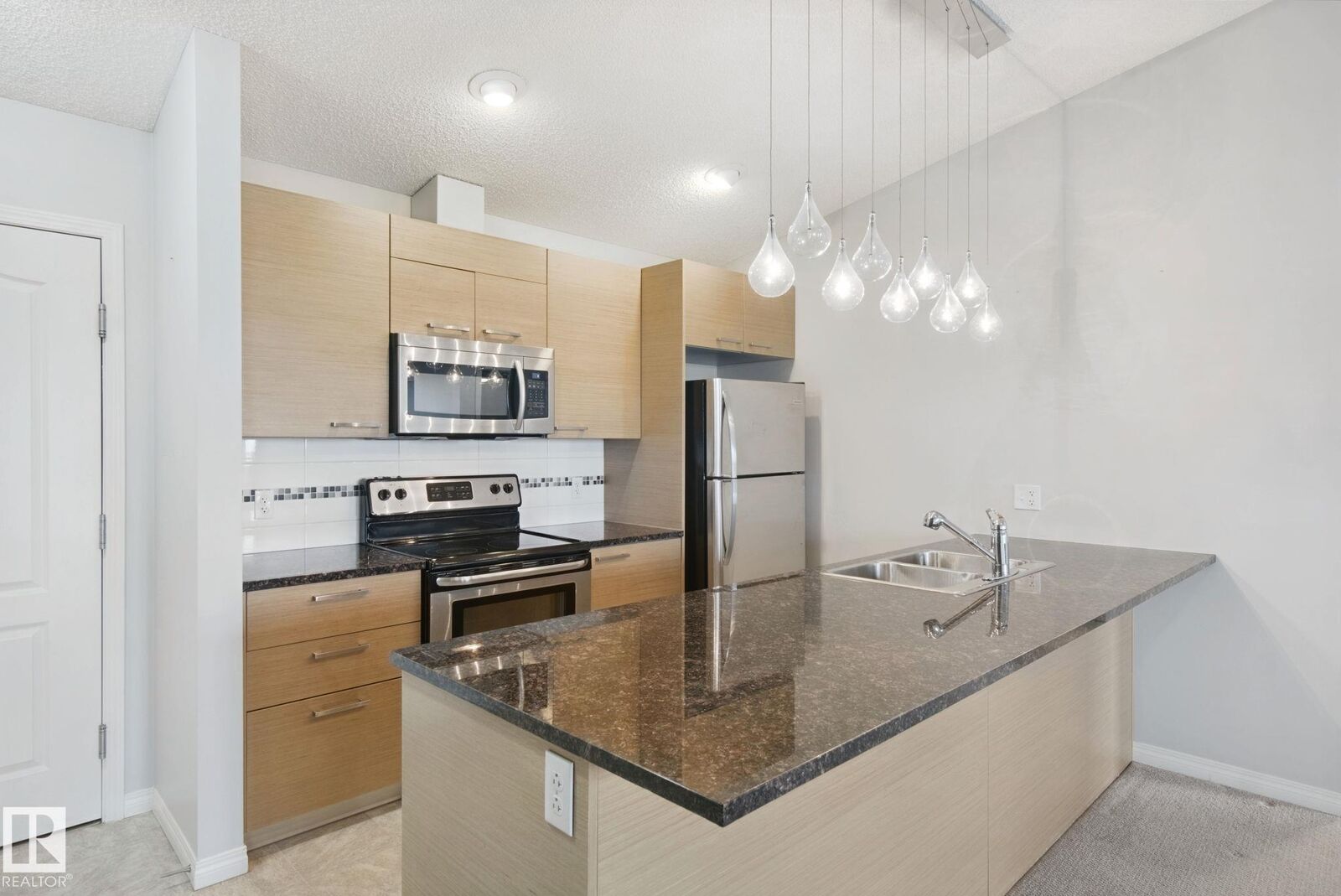 Property Photo:  9351 Simpson Drive NW 3415  AB T6R 0N4 