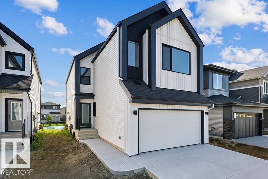 Property Photo:  5011 Cawsey Link SW  AB T6W 5G4 