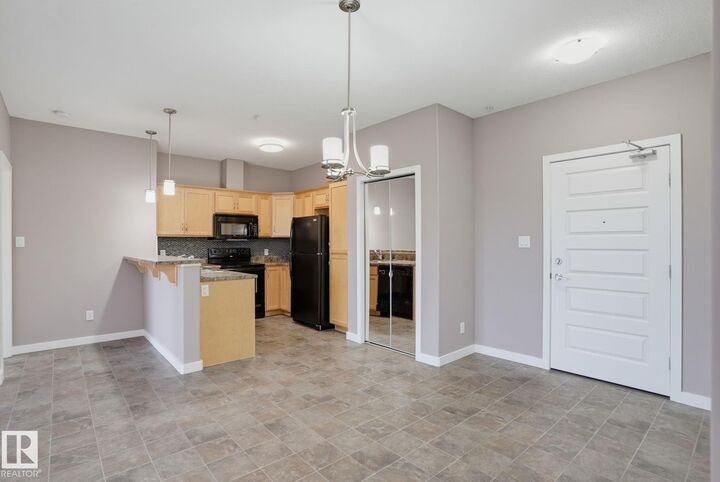 Property Photo:  304 Ambleside Link SW 310  AB T6W 0V2 