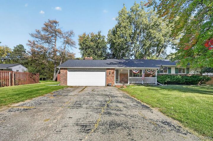 Property Photo:  9096 Carpenter Road  MI 48433 1012 