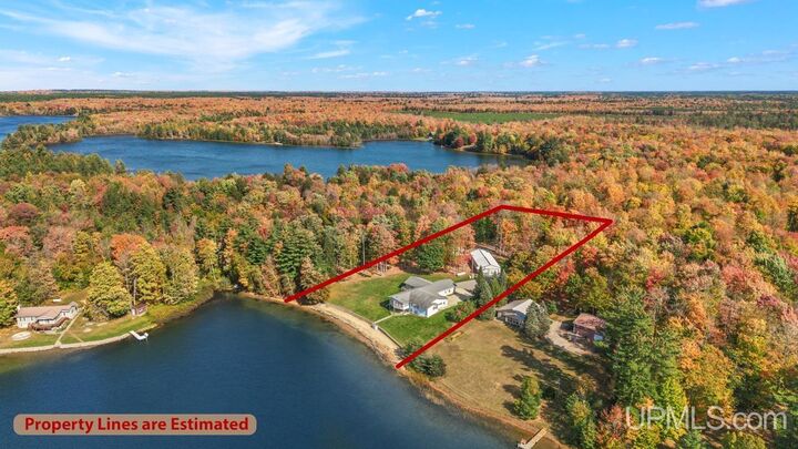 Property Photo:  N3793 Peninsula Point Road  MI 49862 