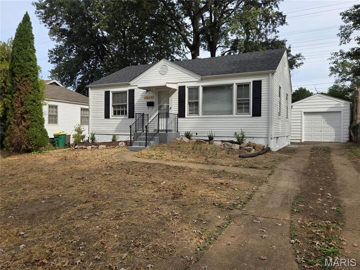 Property Photo:  7617 Taber Drive  MO 63133 