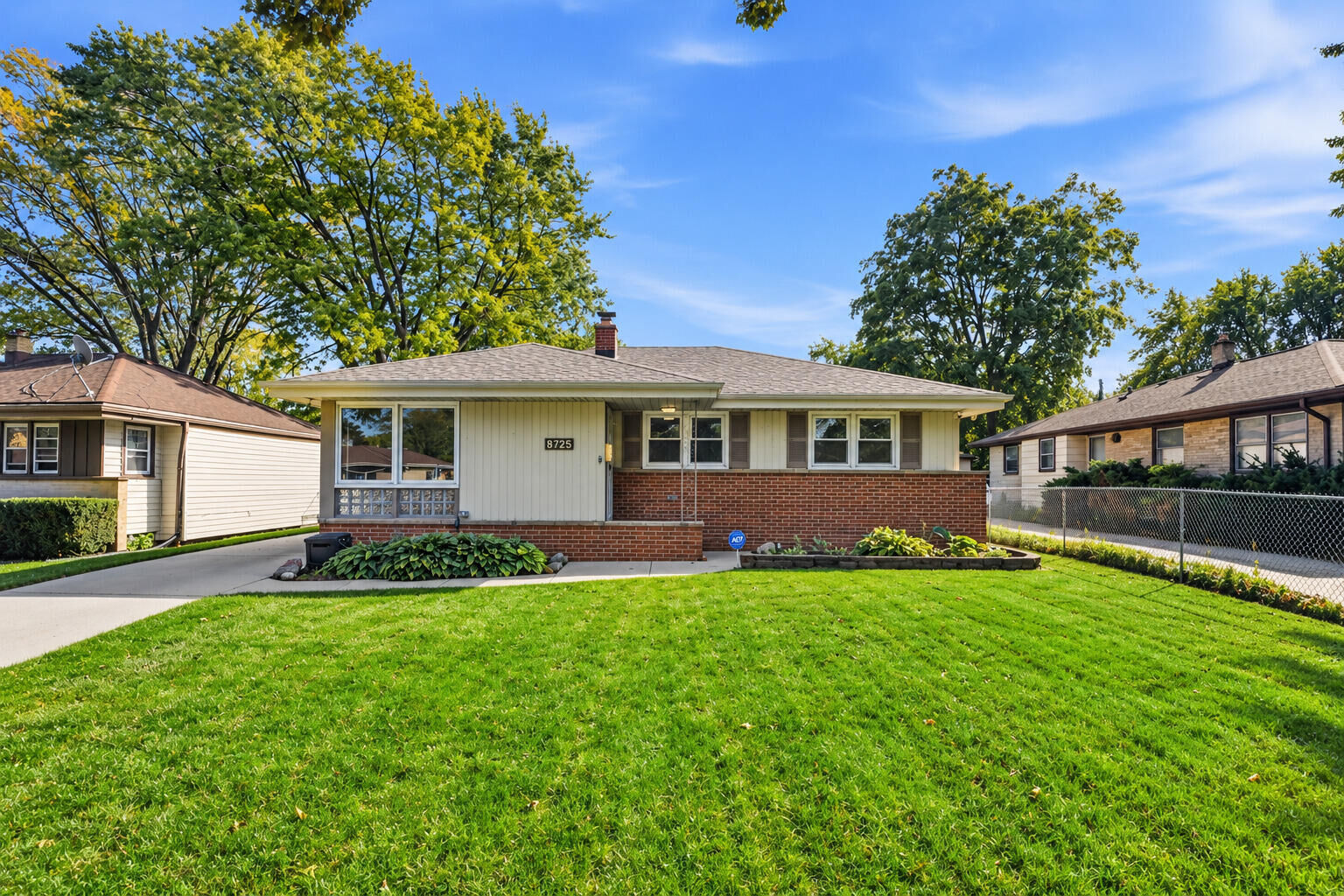 Property Photo: 8725 W Palmetto Ave WI 53225