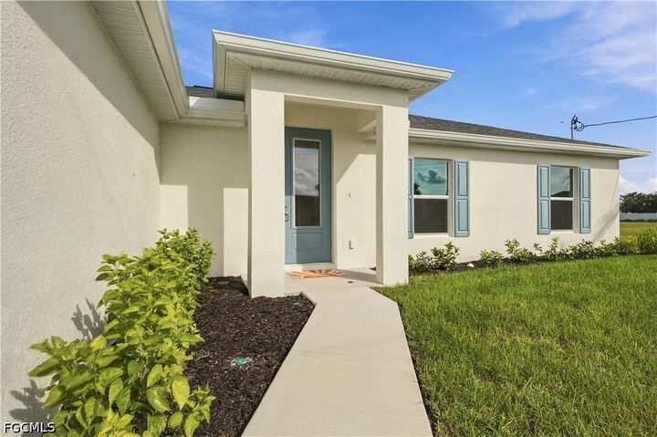 Property Photo: 1135 NW 8th Place FL 33993