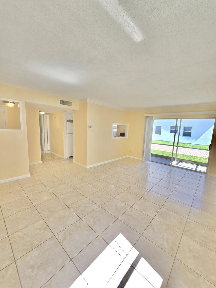 Property Photo: 104 SE 10th Street 101 FL 33441