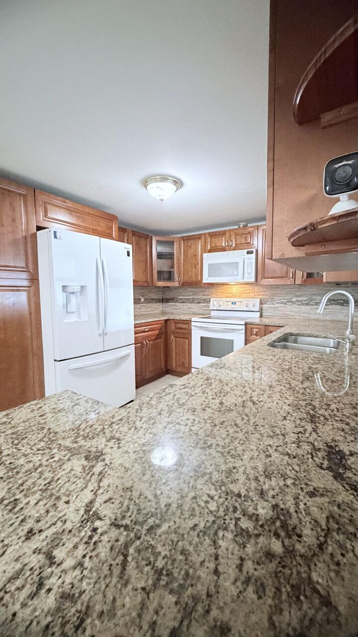 Property Photo:  4554 Sunset Lane  FL 33415 