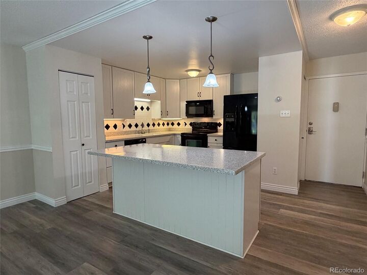 Property Photo: 9385 E Center Avenue 7A CO 80247