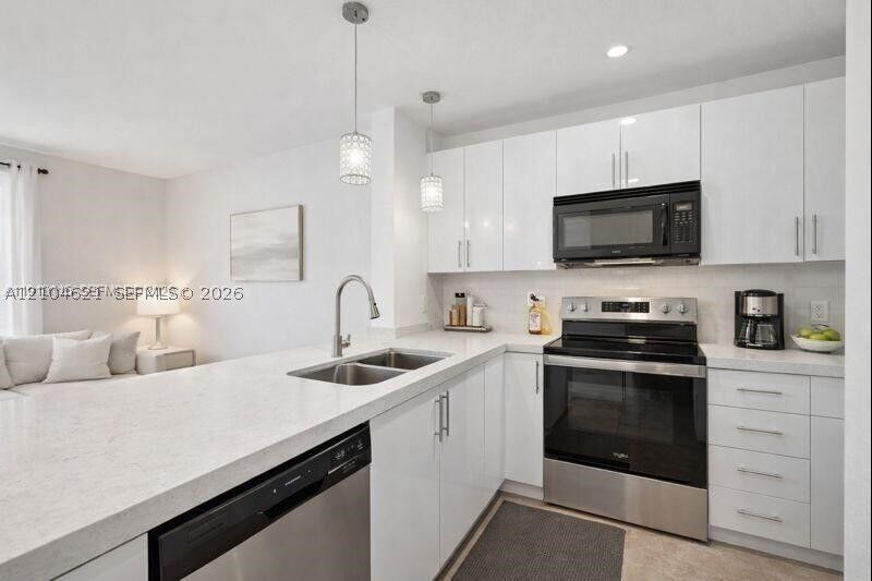 Property Photo: 1490 NE 33rd Rd 104-18 FL 33033