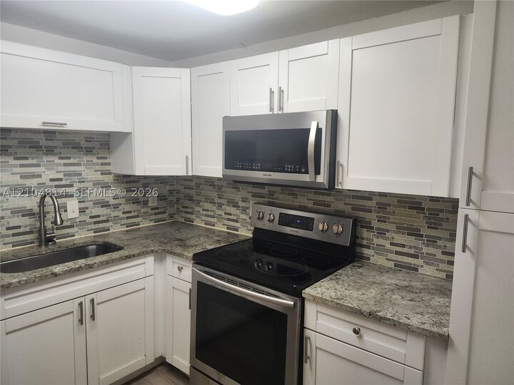 Property Photo:  12727 N Ola 1  FL 33612 