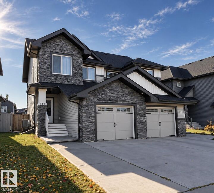 Property Photo:  129 Amberley Way  AB T8H 0X2 