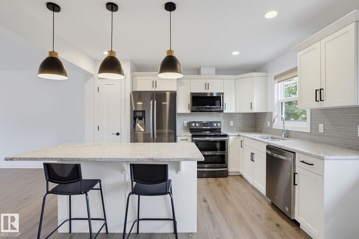 Property Photo:  4205 30 Street NW  AB T6T 2G9 