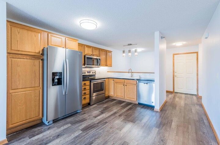 Property Photo: 16154 Main Avenue SE 212 MN 55372