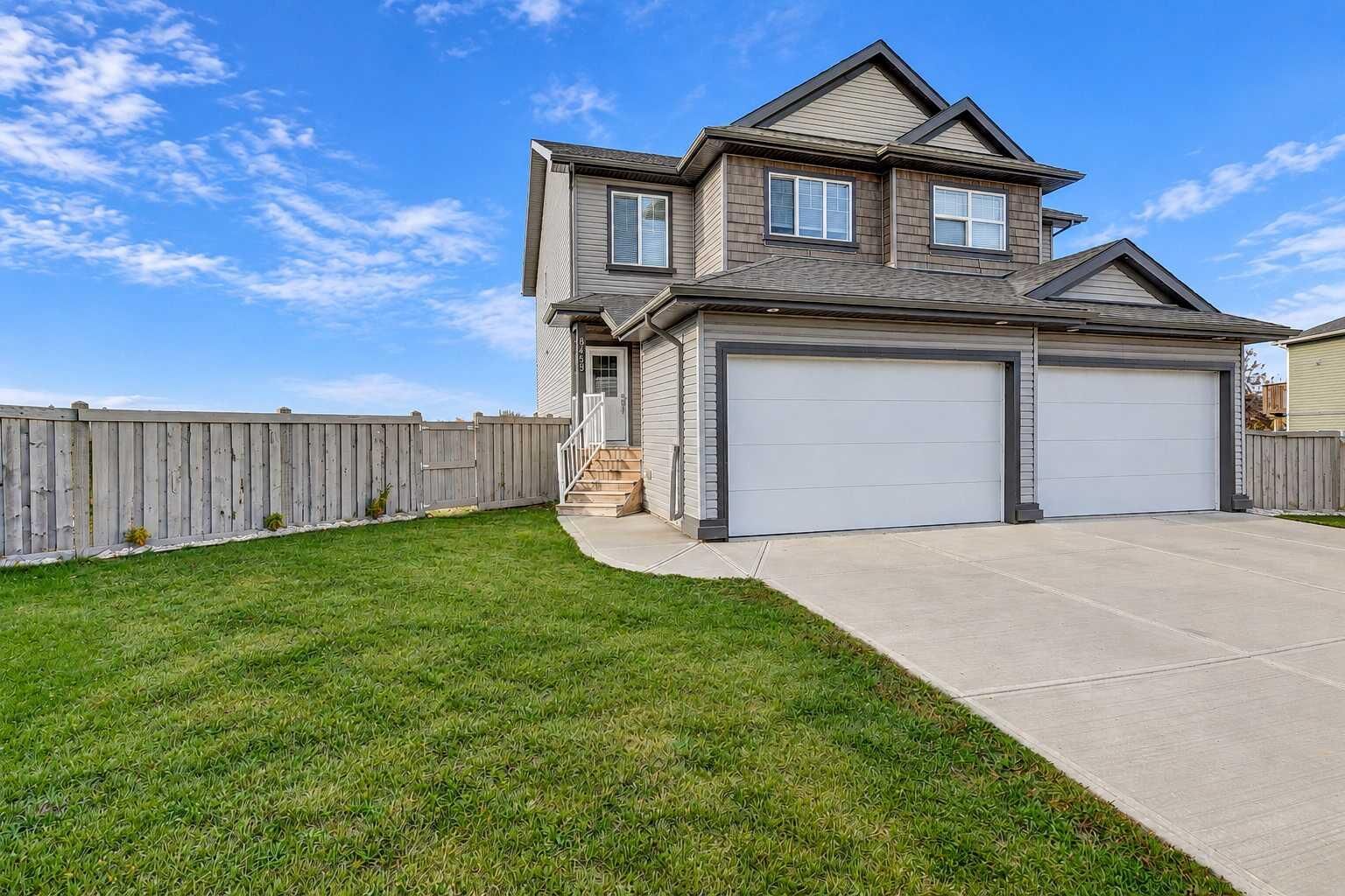Property Photo:  8459 101 Avenue  AB T8X 0R1 