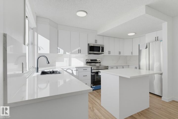 Property Photo:  133 Woodstock NW  AB T5T 0H6 