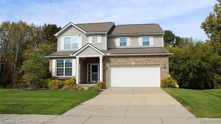 Property Photo:  58180 Sunflower Circle N  MI 48165 
