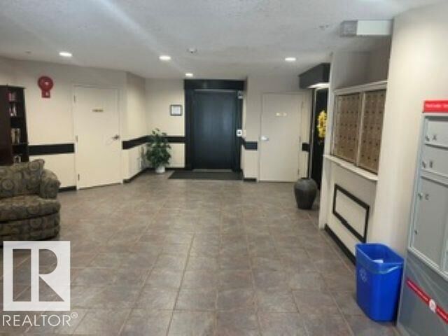 Property Photo:  10951 124 Street NW 415  AB T5M 4E1 