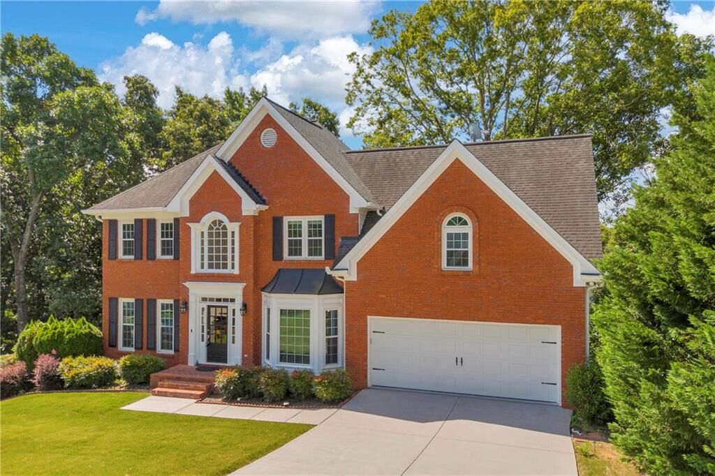 Property Photo:  4910 Red Robin Ridge  GA 30022 
