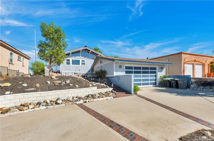 Property Photo:  22976 Blue Bird  CA 92587 