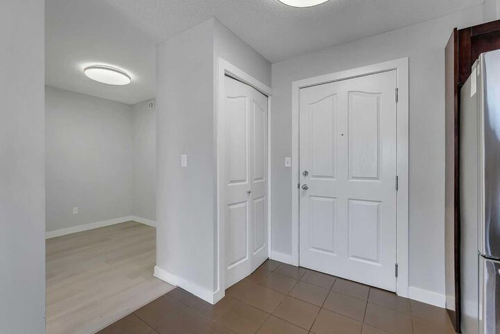 Property Photo:  403 Mackenzie Way SW 2402  AB T4B 3V7 