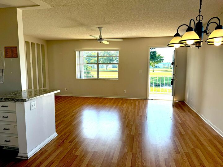 Property Photo:  240 Burgundy E  FL 33484 