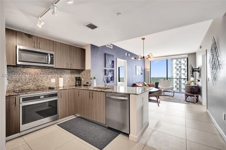 Property Photo:  5350 NW 84th Ave 1004  FL 33166 