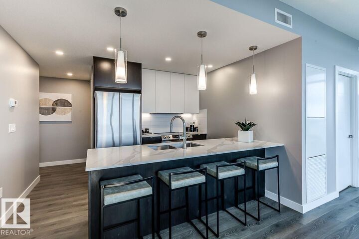 Property Photo:  9922 111 Street NW  AB T5K 1K2 