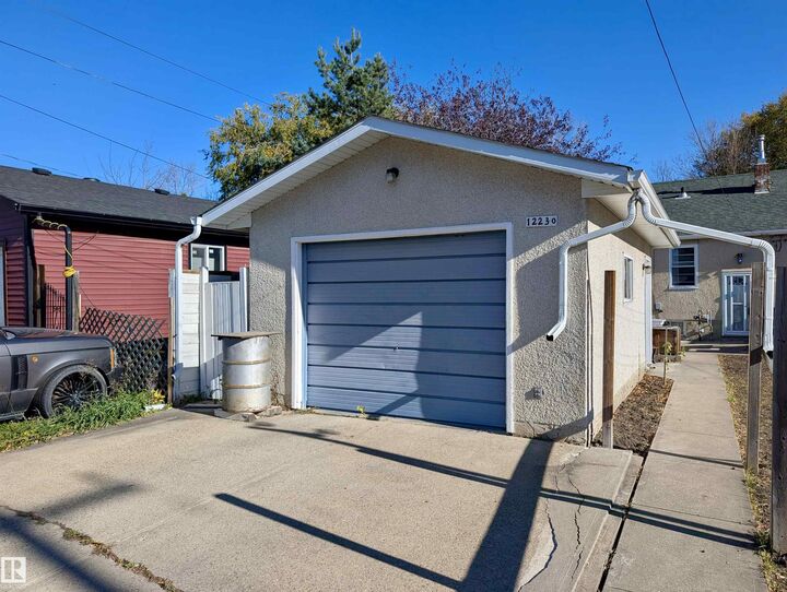 Property Photo:  12230 95A Street NW  AB T5G 1S1 