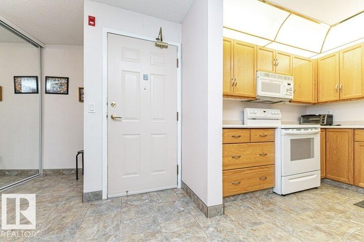 Property Photo:  9926 100 Avenue 216  AB T8L 4E3 