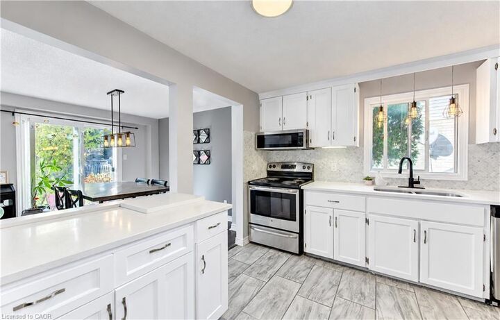 Property Photo:  527B Rosemeadow Crescent  ON N2T 1Z9 